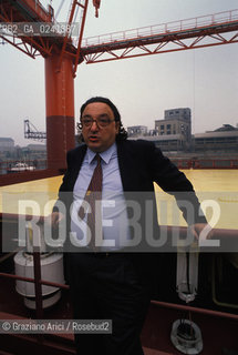 -Venezia,1988. Inaugurazione del modello di paratoia mobile del progetto Mose alla bocche di porto del Lido:il politico Gianni De Michelis ritratto davanti al Mose. lido modello paratoia bocca di porto MOSE consorzio venezia nuova inaugurazione -Venice,1988. Inauguration of the model of mobile gates of the Mose project in the Lido:portrait of the politician Gianni De Michelis  ©Graziano Arici/Rosebud2.