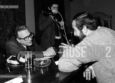 Venezia, 1979.Isola di San Giorgio. Convegno nazionale sulla sicurezza nucleare:il Ministro Antonio Bisaglia e il politico Mario Capanna.protesta manifestazione Politica convegno nazionale sicurezza nucleare.Venice, 1979.San Giorgio island. The national convention on nuclear safety:the politician Mario Capanna with the Minister Antonio Bisaglia  ©Graziano Arici/Rosebud2  astga ©Graziano Arici/Rosebud2