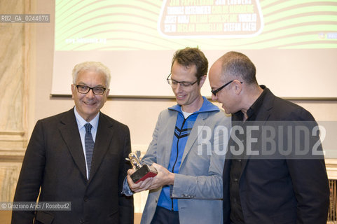 Venice,10.10.2011.Theatre Biennale.41st International Theatre Festival.Awards ceremony of the Golden Lion. The Silver Lion prize at Stefan Kaegi, stage director of Rimini Protokoll, artistic collective based in BerlinVenezia.The President of Biennale Paolo Baratta with Stefan Kaegi and Àlex Rigola, director of Biennale Teatro..Venezia,10.10.2011.Biennale teatro.41°Festival Internazionale Teatro. Stefan Kaegi,direttore del collettivo artistico berlinese Rimini Protokoll,rieceve il Leone dargento. Il Presidente della Biennale Paolo Baratta,Stefan Kaegi e Àlex Rigola,direttore Biennale teatro.