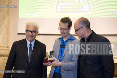 Venice,10.10.2011.Theatre Biennale.41st International Theatre Festival.Awards ceremony of the Golden Lion. The Silver Lion prize at Stefan Kaegi, stage director of Rimini Protokoll, artistic collective based in BerlinVenezia.The President of Biennale Paolo Baratta with Stefan Kaegi and Àlex Rigola, director of Biennale Teatro..Venezia,10.10.2011.Biennale teatro.41°Festival Internazionale Teatro. Stefan Kaegi,direttore del collettivo artistico berlinese Rimini Protokoll,rieceve il Leone dargento. Il Presidente della Biennale Paolo Baratta,Stefan Kaegi e Àlex Rigola,direttore Biennale teatro.