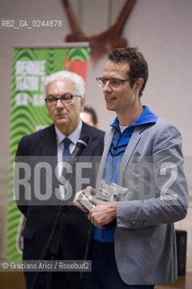 Venice,10.10.2011.Theatre Biennale.41st International Theatre Festival.Awards ceremony of the Golden Lion. The Silver Lion prize at Stefan Kaegi, stage director of Rimini Protokoll, artistic collective based in BerlinVenezia.The President of Biennale Paolo Baratta with Stefan Kaegi..Venezia,10.10.2011.Biennale teatro.41°Festival Internazionale Teatro. Stefan Kaegi,direttore del collettivo artistico berlinese Rimini Protokoll,rieceve il Leone dargento. Il Presidente della Biennale Paolo Baratta con Stefan Kaegi