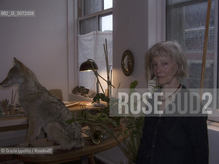 Artist performer Joan Jonas in her house in Soho, New York, with stuffed dog she uses in her performances ©Grazia Ippolito/Rosebud2