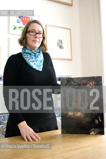 Portuguese painter Gabriela Albergaria,with one of her pictures, in her house in Baixa, Lisbon, Portugal,3/2008    Grazia Ippolito / Blackarchives ©Grazia Ippolito/Rosebud2