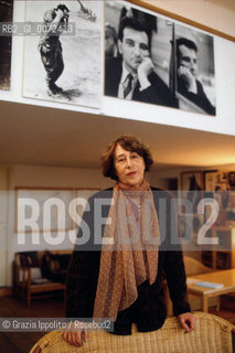 Italian painter Giosetta Fioroni, wife of writer Goffredo Parise, in her studio in Trastevere, Rome, on the back Parises photos ©Grazia Ippolito/Rosebud2