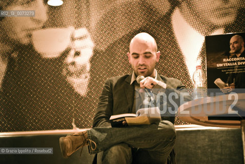 Italian writer and journalist, Roberto Saviano, living since 2006 under a permanent police escort, pictured in Milano during the presentation of his bookVieni via con me published by Feltrinelli. ©Grazia Ippolito/Rosebud2