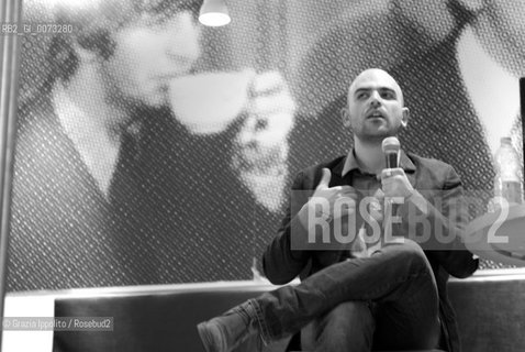 Italian writer and journalist, Roberto Saviano, living since 2006 under a permanent police escort, pictured in Milan during the launching of his book Vieni via con me published by Feltrinelli. ©Grazia Ippolito/Rosebud2