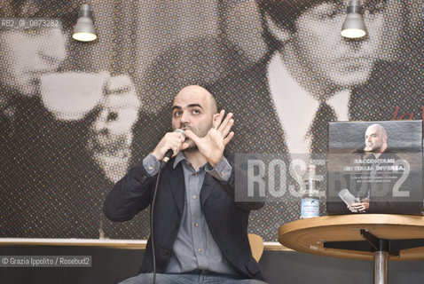 Italian writer and journalist, Roberto Saviano, living since 2006 under a permanent police escort, pictured in Milano during the presentation of his bookVieni via con me published by Feltrinelli. ©Grazia Ippolito/Rosebud2