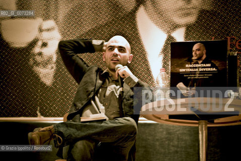 Italian writer and journalist, Roberto Saviano, living since 2006 under a permanent police escort, pictured in Milano during the presentation of his bookVieni via con me published by Feltrinelli. ©Grazia Ippolito/Rosebud2