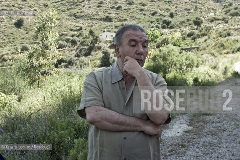 Antonio Presti, sicilian mecenate, founder of Fiumara dArte, at Castel di Tusa, Cefalù, Sicily, heres near Pietro Consagras work ©Grazia Ippolito/Rosebud2