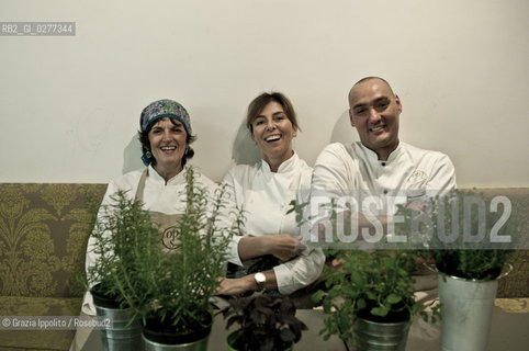 Simone Salvini, vegetarian and vegan master chef,in his restaurant Ops! in via Bergamo,56 in Rome,with his assistants Eleonora and Rina ©Grazia Ippolito/Rosebud2