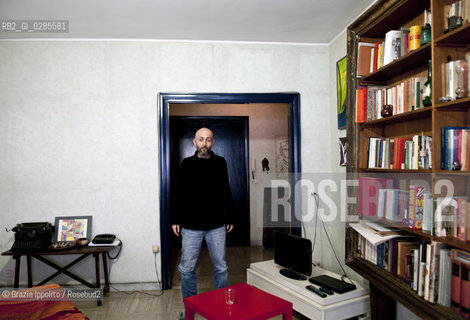 Emanuele Santi, italian writer author ofIl portiere e lo stranieropublished byLAsino doro and contibutor of left magazine as a soccer s expert, pictured in his house in Rome ©Grazia Ippolito/Rosebud2