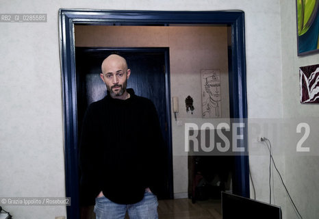 Emanuele Santi, italian writer author ofIl portiere e lo stranieropublished byLAsino doro and contibutor of left magazine as a soccer s expert, pictured in his house in Rome ©Grazia Ippolito/Rosebud2