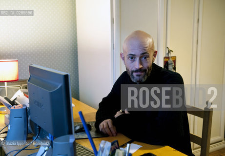 Emanuele Santi, italian writer author ofIl portiere e lo stranieropublished byLAsino doro and contibutor of left magazine as a soccer s expert, pictured in his house in Rome ©Grazia Ippolito/Rosebud2
