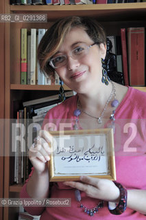 Antonella Cilento, author of Lisario o linfinito piacere delle donnepublished by Mondadori, in her house in Naples,with an arab pray to save books from insects ©Grazia Ippolito/Rosebud2