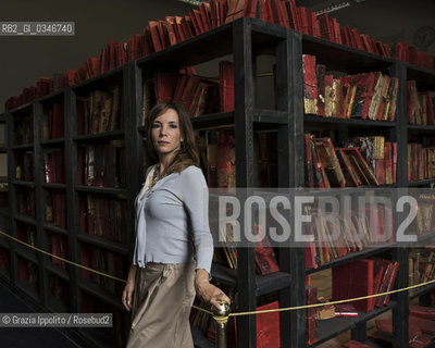 Simona Sparaco, author of Lequazione dellamoreand Nessuno sa di noipublished by giunti, pictured in Milano at Palazzo Sormani,near an artwork of Pizzogreco ©Grazia Ippolito/Rosebud2