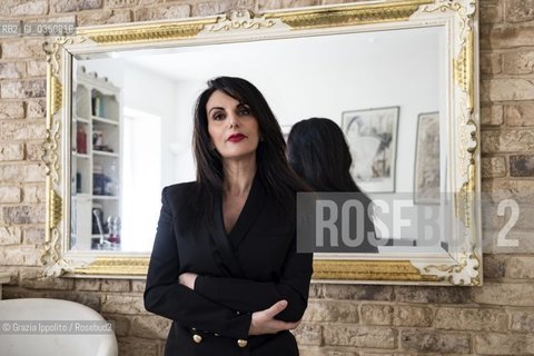 Anilda Ibrahimi, writer, born in Albania, living in Italy author of numerous novels such as Rosso come una sposa and Il tuo nome è una promessa published by Einaudi, in april 2017,pictured in her house in Rome, 15/02/2017 ©Grazia Ippolito/Rosebud2