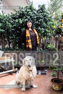 Antonella Ossorio, author of La Mammana,next novel will be published in november 2017, pictured in her house in Naples with dog Anita ©Grazia Ippolito/Rosebud2