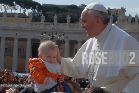 Pope Francis with children in Vatican City, Rome 2013. ©FotografiaFelici/Rosebud2
