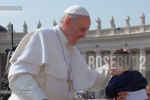 Pope Francis with children in Vatican City, Rome 2013. ©FotografiaFelici/Rosebud2