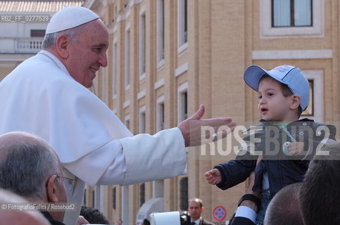 Pope Francis with children in Vatican City, Rome 2013. ©FotografiaFelici/Rosebud2