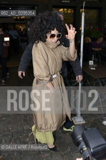 Lady Gaga takes a drink at Brauhaus Sion in Cologne on September 06, 2014. ©DALLE APRF/Rosebud2