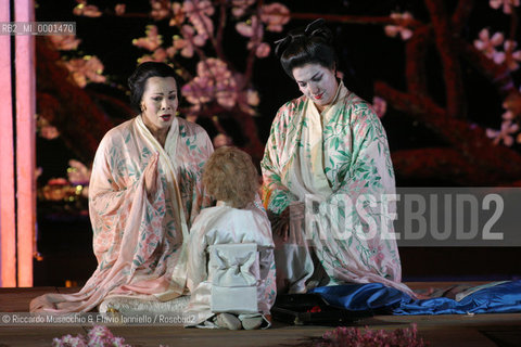 Jul 05 2006, Rome, Baths of Caracalla.Opera MADAMA BUTTERFLY .Booklet of Luigi Illica and Giuseppe Giacosa.Music of Giacomo Puccini .Opera Theatre Orchestra and Choir.Conductor: Donato Renzetti.Light and visual designer: Renzo Giacchieri.Coreographie: Hal Yamanouchi..In the picture: Suzuki, Renata Lamanda and Madama Butterfly (Cio-Cio-San), Isabelle Kabatu.  ©Riccardo Musacchio & Flavio Ianniello/Rosebud2