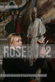 Rome, Santa Maria del Popolo Nov 22  2006.Portrait of the artist  Natalia Tsarkova with her painting of Pope Giovanni Paolo II and in the background, the Pinturicchio frescos in chapels..  ©Riccardo Musacchio & Flavio Ianniello/Rosebud2