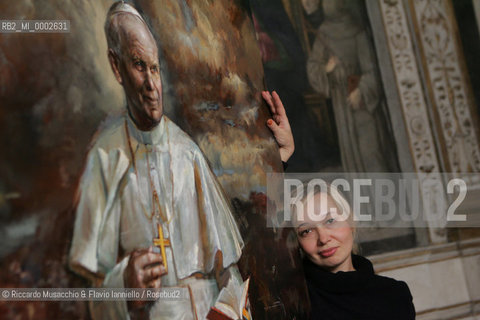 Rome, Santa Maria del Popolo Nov 22  2006.Portrait of the artist  Natalia Tsarkova with her painting of Pope Giovanni Paolo II and in the background, the Pinturicchio frescos in chapels..  ©Riccardo Musacchio & Flavio Ianniello/Rosebud2