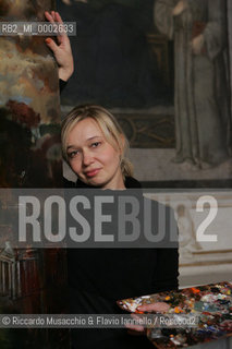 Rome, Santa Maria del Popolo Nov 22  2006.Portrait of the artist  Natalia Tsarkova with her painting of Pope Giovanni Paolo II and in the background, the Pinturicchio frescos in chapels..  ©Riccardo Musacchio & Flavio Ianniello/Rosebud2