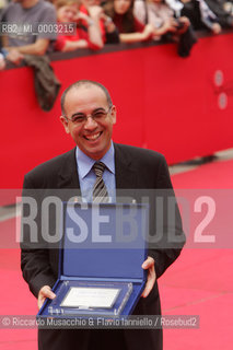 Rome, Auditorium Oct 21 2006..Romefilmfest 2006: the winners and the Awards..In the picture: the italian director wins the Blockbuster Award for the movie La Sconosciuta.  ©Riccardo Musacchio & Flavio Ianniello/Rosebud2