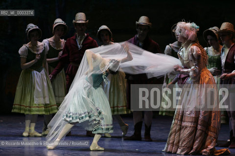 Feb 28 2006, Rome Opera Theatre .GISELLE, a ballet from music of Adolphe-Charles Adam .Orchestra and ballet company of Opera Theatre.conductor: David Coleman.Coreografphie of Carla Fracci, by Jean Coralli, Jules Perrot, Marius Petipa, Anton Dolin .Scene and Costumes: Anna Anni.Dancers:.Giselle: Svetlana Lunkina.The Prince Albrecht: Yuri Vyskubenko.  ©Riccardo Musacchio & Flavio Ianniello/Rosebud2