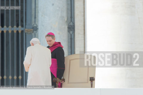 Vatican City Feb 27 2013. Pope Benedict XVI held his last Mass as pontiff at St Peters Square. In the picture: the Holy Father with his secretary Bishop Georg Gaenswain leave the papa throne.  ©Riccardo Musacchio & Flavio Ianniello/Rosebud2