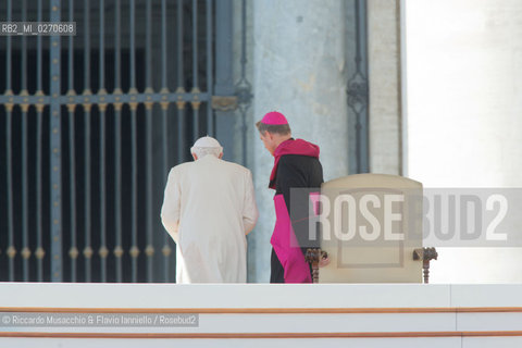 Vatican City Feb 27 2013. Pope Benedict XVI held his last Mass as pontiff at St Peters Square. In the picture: the Holy Father with his secretary Bishop Georg Gaenswain leave the papa throne.  ©Riccardo Musacchio & Flavio Ianniello/Rosebud2