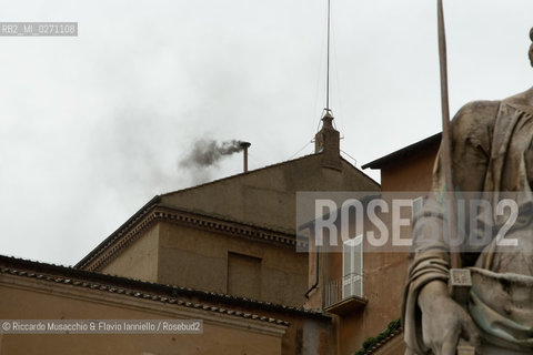 Vatican City, Italy - March 13 2013. Cardinal Jorge Mario Bergoglio, archbishop of Buenos Aires, elected as Pope Francesco. in the picture: black smoke from the Sistine Chapel chimney.  ©Riccardo Musacchio & Flavio Ianniello/Rosebud2
