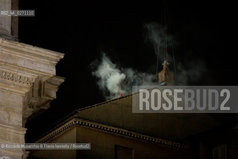 Vatican City, Italy - March 13 2013. Cardinal Jorge Mario Bergoglio, archbishop of Buenos Aires, elected as Pope Francesco. in the picture: white smoke from the Sistine Chapel chimney.  ©Riccardo Musacchio & Flavio Ianniello/Rosebud2