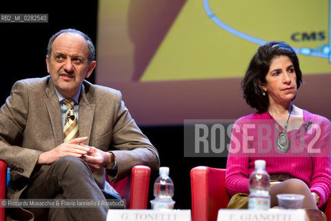 Roma, Auditorium Parco della Musica 14 03 2013.Libri Come. Festa del Libro e della lettura.A caccia del bosone di Higgs.Nella foto da sin: Guido Tonelli, Fabiola Gianotti. ©Riccardo Musacchio & Flavio Ianniello/Rosebud2