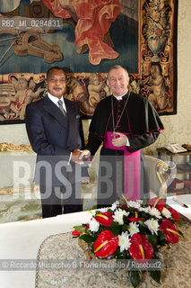 Città del Vaticano, Biblioteca 09 12  2013.Udienza del Santo Padre Papa Francesco al Presidente della Repubblica del Congo, S.E. Denis SASSOU NGUESSO..Nella foto: il saluto con il Segretario di Stato Monsignor Pietro Parolin. ©Riccardo Musacchio & Flavio Ianniello/Rosebud2