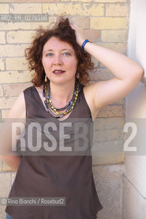 Roma 5 luglio 2013..Irene Ranaldi, sociologa, storica delle identità metropolitane, saggista, fotografata a Roma nel quartiere di Testaccio.. ©Rino Bianchi/Rosebud2
