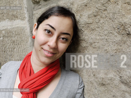 Rome October 26,2011..Maya Zankoul, writer, designer, cartoonist, blogger, raised in Jeddah, lives in Lebanon, photographed in Rome in the Prati district/Maya Zankoul, scrittrice, designer, cartoonist, blogger, cresciuta a Jeddah, vive in Libano, fotografata a Roma nel quartiere Prati..Photo: RINO BIANCHI ©Rino Bianchi/Rosebud2