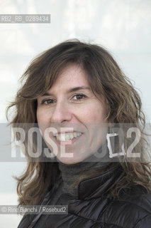 Rome March 15, 2014..Chiara Moscardelli, photographed in Rome, writer. His debut novel, I wanted to be a dead cat (Einaudi Stile Libero, 2011), has obtained a great success and is the subject of a strong cult following, especially among readers on the net. In 2013 has published, for Einaudi Stile Libero, life is not a movie (but sometimes it looks like)/Chiara Moscardelli, fotografata a Roma, scrittrice. Il suo romanzo desordio, Volevo essere una gatta morta (Einaudi Stile Libero, 2011), ha ottenuto un grande successo di pubblico ed è oggetto di un tenace culto, soprattutto tra i lettori della rete. Nel 2013 ha pubblicato, sempre per Einaudi Stile Libero, La vita non è un film (ma a volte ci somiglia)..Photo: RINO BIANCHI ©Rino Bianchi/Rosebud2