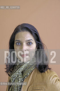 Rome March 16, 2014..Jhumpa Lahiri, photographed in Rome, was founded in London by Bengali parents and raised in the United States. His first collection of short stories The woes of interpreter (Interpreter of Maladies) he immediately struck the attention of many readers and critics received the Pulitzer Prize for fiction in 2000/Jhumpa Lahiri, fotografata a Roma,è nata a Londra da genitori bengalesi e cresciuta negli Stati Uniti. La sua prima raccolta di racconti brevi Linterprete dei malanni (Interpreter of Maladies) ha immediatamente colpito lattenzione di molti lettori e della critica ottenendo il Premio Pulitzer per la narrativa nel 2000. .Photo: RINO BIANCHI ©Rino Bianchi/Rosebud2