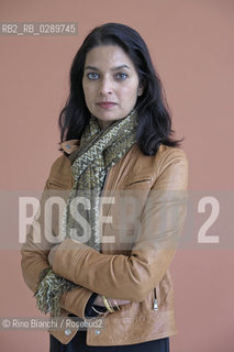 Rome March 16, 2014..Jhumpa Lahiri, photographed in Rome, was founded in London by Bengali parents and raised in the United States. His first collection of short stories The woes of interpreter (Interpreter of Maladies) he immediately struck the attention of many readers and critics received the Pulitzer Prize for fiction in 2000/Jhumpa Lahiri, fotografata a Roma,è nata a Londra da genitori bengalesi e cresciuta negli Stati Uniti. La sua prima raccolta di racconti brevi Linterprete dei malanni (Interpreter of Maladies) ha immediatamente colpito lattenzione di molti lettori e della critica ottenendo il Premio Pulitzer per la narrativa nel 2000. .Photo: RINO BIANCHI ©Rino Bianchi/Rosebud2