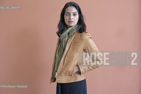 Rome March 16, 2014..Jhumpa Lahiri, photographed in Rome, was founded in London by Bengali parents and raised in the United States. His first collection of short stories The woes of interpreter (Interpreter of Maladies) he immediately struck the attention of many readers and critics received the Pulitzer Prize for fiction in 2000/Jhumpa Lahiri, fotografata a Roma,è nata a Londra da genitori bengalesi e cresciuta negli Stati Uniti. La sua prima raccolta di racconti brevi Linterprete dei malanni (Interpreter of Maladies) ha immediatamente colpito lattenzione di molti lettori e della critica ottenendo il Premio Pulitzer per la narrativa nel 2000. .Photo: RINO BIANCHI ©Rino Bianchi/Rosebud2