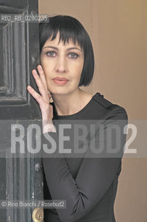 Rome March 27, 2014..Candida Morvillo, photographed in Rome, a columnist for the Corriere della Sera, signing on Corriere.it video under Pernientecandida. He directed the weekly Novella 2000. Published by Rizzoli this paper La Repubblica delle veline, Valmiki and vices of the girls of the tivvù from the 1950s to the present day. Won, in July 2006, the Ischia international journalism award Angelo Rizzoli as best journalist under 35 for print media and agencie/Candida Morvillo, fotografata a Roma, editorialista del Corriere della Sera, firma su “Corriere.it” la video rubrica “Pernientecandida”. Ha diretto il settimanale “Novella 2000”.  Ha pubblicato per Rizzoli il saggio La Repubblica delle veline, vita vezzi e vizi delle ragazze della tivvù dagli anni cinquanta ai giorni nostri. Ha vinto, nel luglio 2006, il Premio Ischia Internazionale di Giornalismo Angelo Rizzoli come miglior giornalista under 35 per la carta stampata e le agenzie..Photo: RINO BIANCHI ©Rino Bianchi/Rosebud2