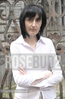 Rome Juin 10, 2014..Elisa Ruotolo, photographed in Rome, writer, was born in 1975 in Santa Maria a Vico (Ce) where he lives to this day. Teaches Italian in a high school. Overnight in Ha for 2010 debut, with the collection Ho rubato la pioggia, winner Renato Fucini and del Award finalist at the Premio Carlo Cocito 2010. In 2014 has posted Ovunque, proteggici, Premio Strega 2014 selection/Elisa Ruotolo, fotografata a Roma, scrittrice, è nata nel 1975 a Santa Maria a Vico (Ce) dove vive tuttora. Insegna Italiano in una scuola superiore. Ha esordito per Nottetempo nel 2010, con la raccolta Ho rubato la pioggia, vincitrice del Premio Renato Fucini e finalista al Premio Carlo Cocito 2010. Nel 2014 ha pubblicato Ovunque, proteggici, selezione Premio Strega 2014..Photo: RINO BIANCHI ©Rino Bianchi/Rosebud2