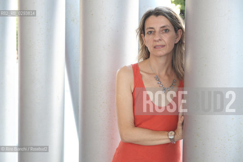 Rome August 7, 2014..Chiara Mezzalama, Italian writer, photographed at the MAXXI in Rome a few days before his transfer to Paris/Chiara Mezzalama, scrittrice italiana, fotografata a Roma al MAXXI qualche giorno prima del suo trasferimento a Parigi. .Photo: RINO BIANCHI ©Rino Bianchi/Rosebud2