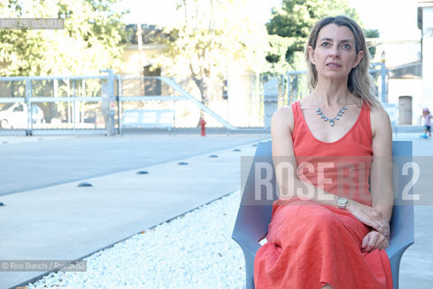 Rome August 7, 2014..Chiara Mezzalama, Italian writer, photographed at the MAXXI in Rome a few days before his transfer to Paris/Chiara Mezzalama, scrittrice italiana, fotografata a Roma al MAXXI qualche giorno prima del suo trasferimento a Parigi. .Photo: RINO BIANCHI ©Rino Bianchi/Rosebud2