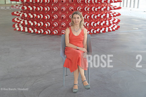 Rome August 7, 2014..Chiara Mezzalama, Italian writer, photographed at the MAXXI in Rome a few days before his transfer to Paris/Chiara Mezzalama, scrittrice italiana, fotografata a Roma al MAXXI qualche giorno prima del suo trasferimento a Parigi. .Photo: RINO BIANCHI ©Rino Bianchi/Rosebud2
