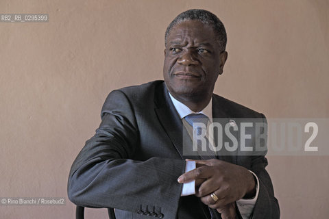 Ferrara October 4, 2014..Denis Mukwege, photographed in Ferrara, is a congolese gynecologist physician who treats women raped and AIDS. Work 18 hours a day in the center that he founded. He was awarded by the Swedish Parliament the Right livelihood considered the alternative Nobel. is nominated for the Nobel Peace Prize/Denis Mukwege, fotografato a Ferrara, è un medico ginecologo congolese che cura le donne stuprate e malate di AIDS. Opera 18 ore al giorno nellcentro che ha fondato. Gli è stato assegnato dal Parlamento svedese il Right livelihood considerato il Nobel alternativo; è candidato al Premio Nobel per la Pace..Photo: RINO BIANCHI ©Rino Bianchi/Rosebud2