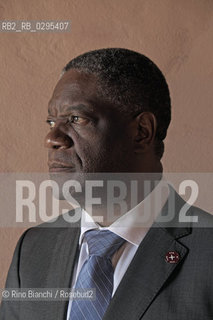 Ferrara October 4, 2014..Denis Mukwege, photographed in Ferrara, is a congolese gynecologist physician who treats women raped and AIDS. Work 18 hours a day in the center that he founded. He was awarded by the Swedish Parliament the Right livelihood considered the alternative Nobel. is nominated for the Nobel Peace Prize/Denis Mukwege, fotografato a Ferrara, è un medico ginecologo congolese che cura le donne stuprate e malate di AIDS. Opera 18 ore al giorno nellcentro che ha fondato. Gli è stato assegnato dal Parlamento svedese il Right livelihood considerato il Nobel alternativo; è candidato al Premio Nobel per la Pace..Photo: RINO BIANCHI ©Rino Bianchi/Rosebud2